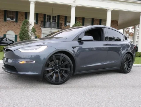 model x pre owned